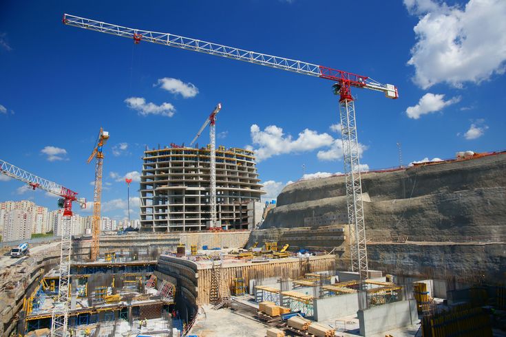 Tower cranes at a large construction site